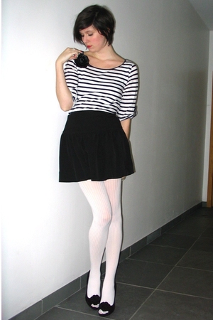 white skirt and black tights