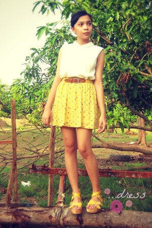 white top and yellow skirt