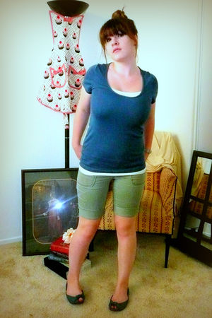 white shirt green shorts