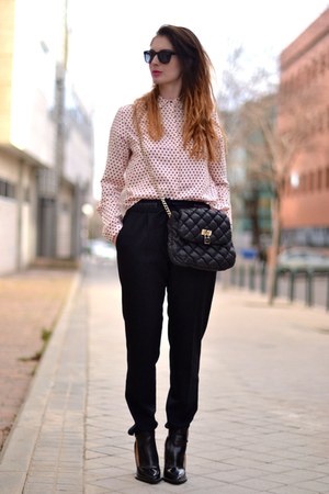 baby pink shirt and black pant