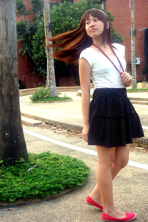 black skirt white shoes